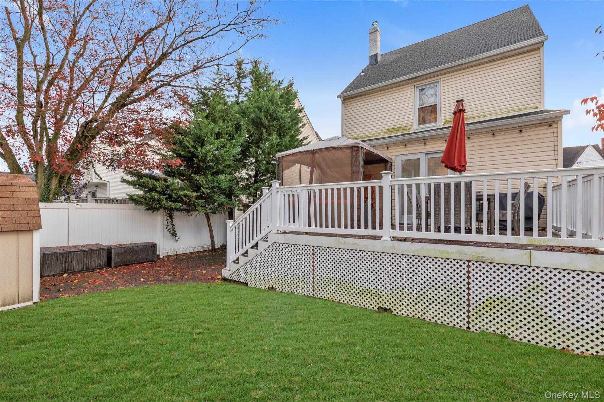 29 Orleans Road Valley Stream, NY 11581 - Photo 18 of 20 a view of a house with a yard