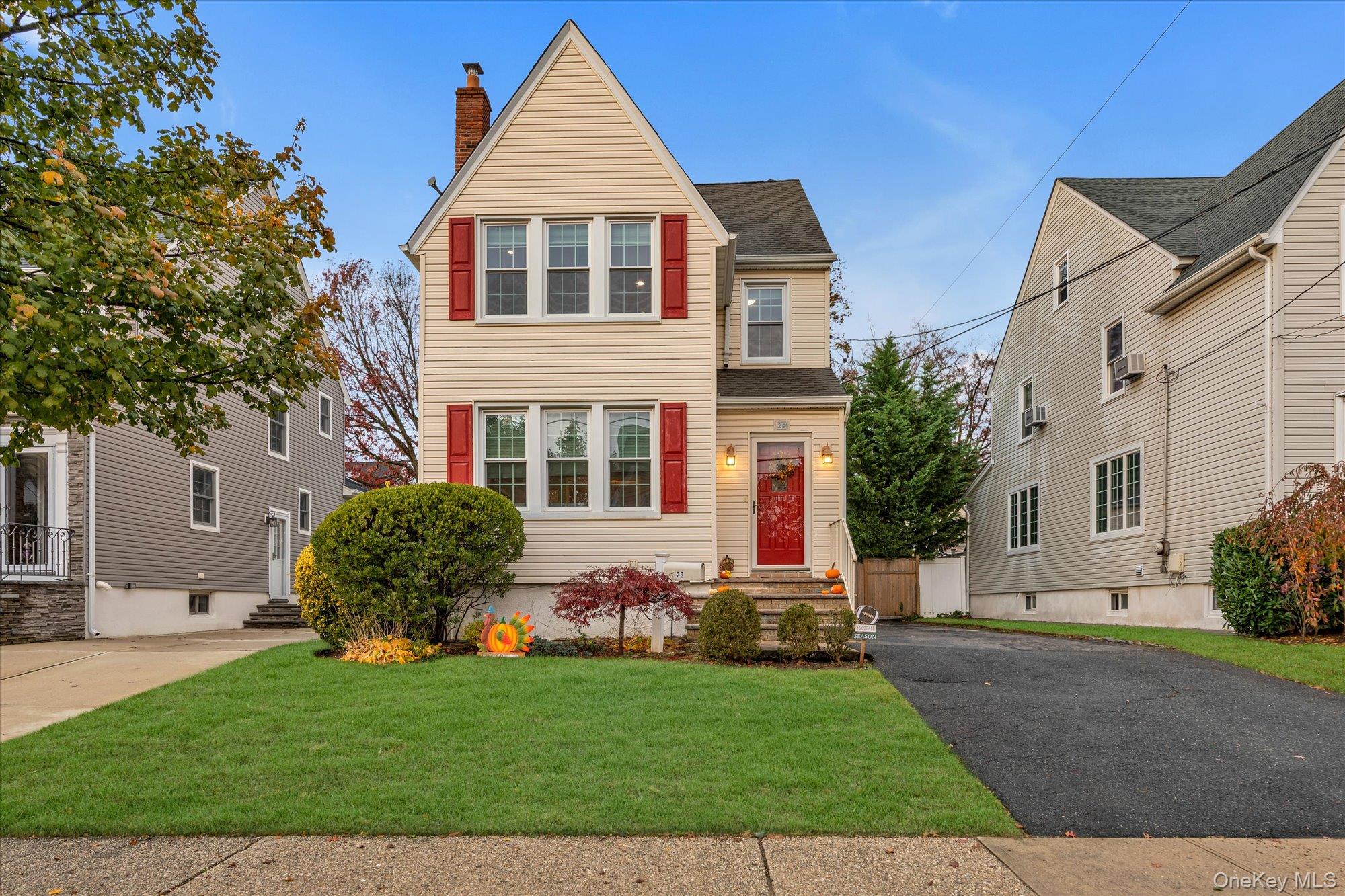 29 Orleans Road Valley Stream, NY 11581 - Photo 19 of 20 a front view of a house with a yard