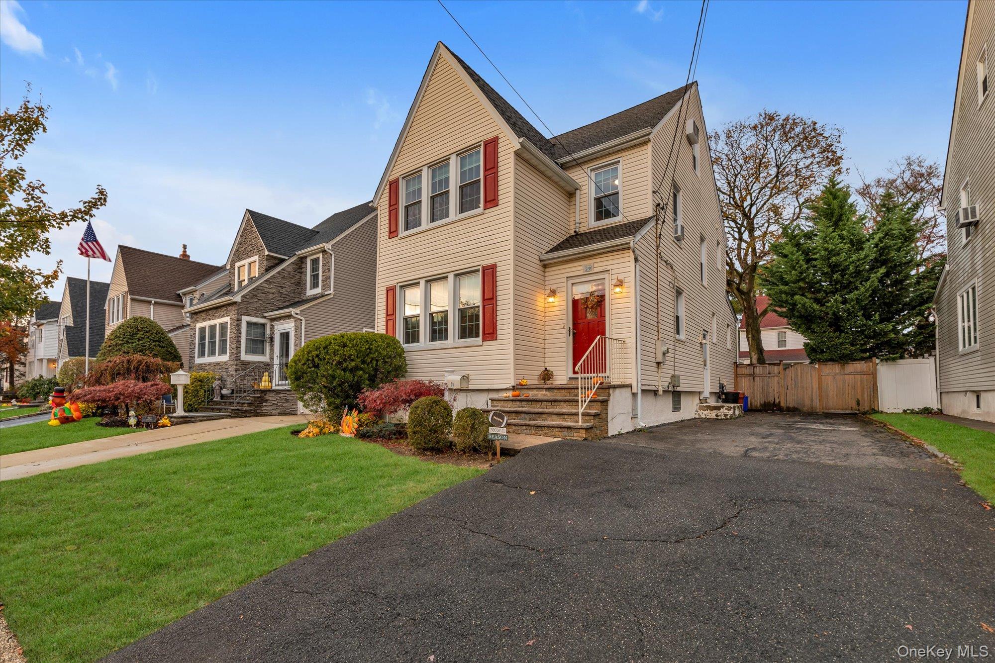 29 Orleans Road Valley Stream, NY 11581 - Photo 20 of 20 a front view of a house with a yard garden and outdoor seating