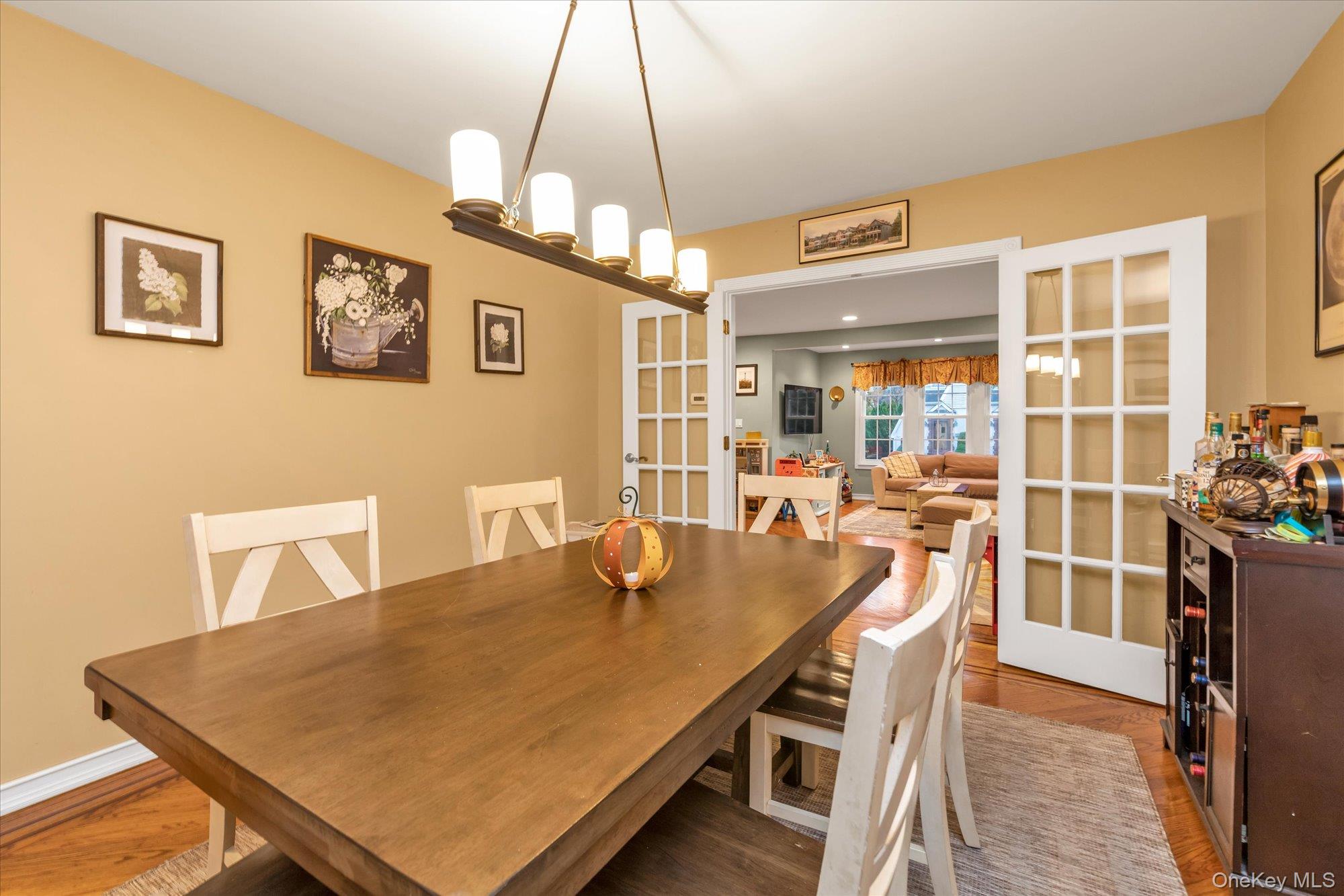 29 Orleans Road Valley Stream, NY 11581 - Photo 6 of 20 a view of a dining room with furniture and a chandelier