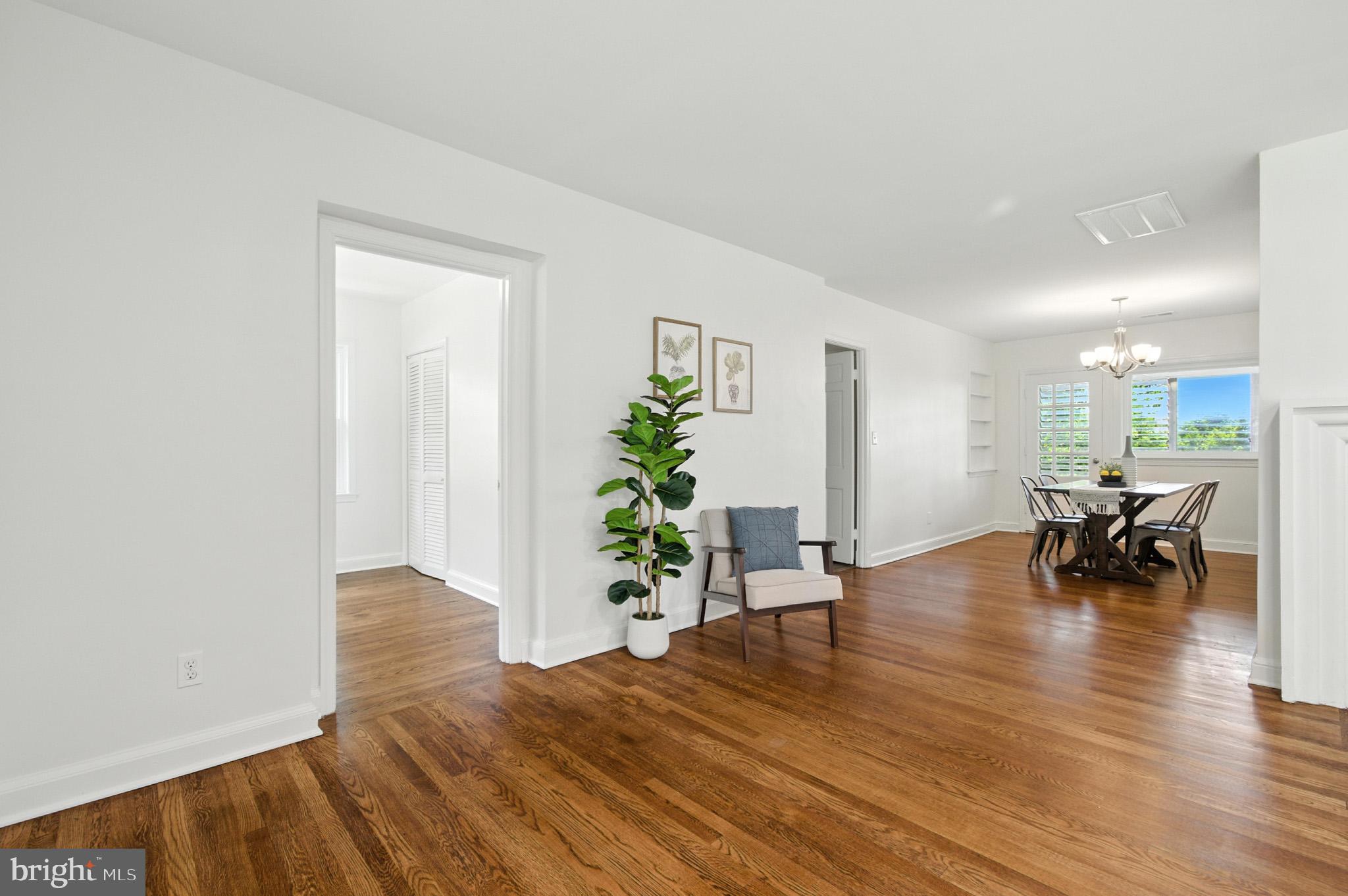 307 Plymouth Street Silver Spring, MD 20901 - Photo 12 of 44 a view of dining room with furniture and wooden floor