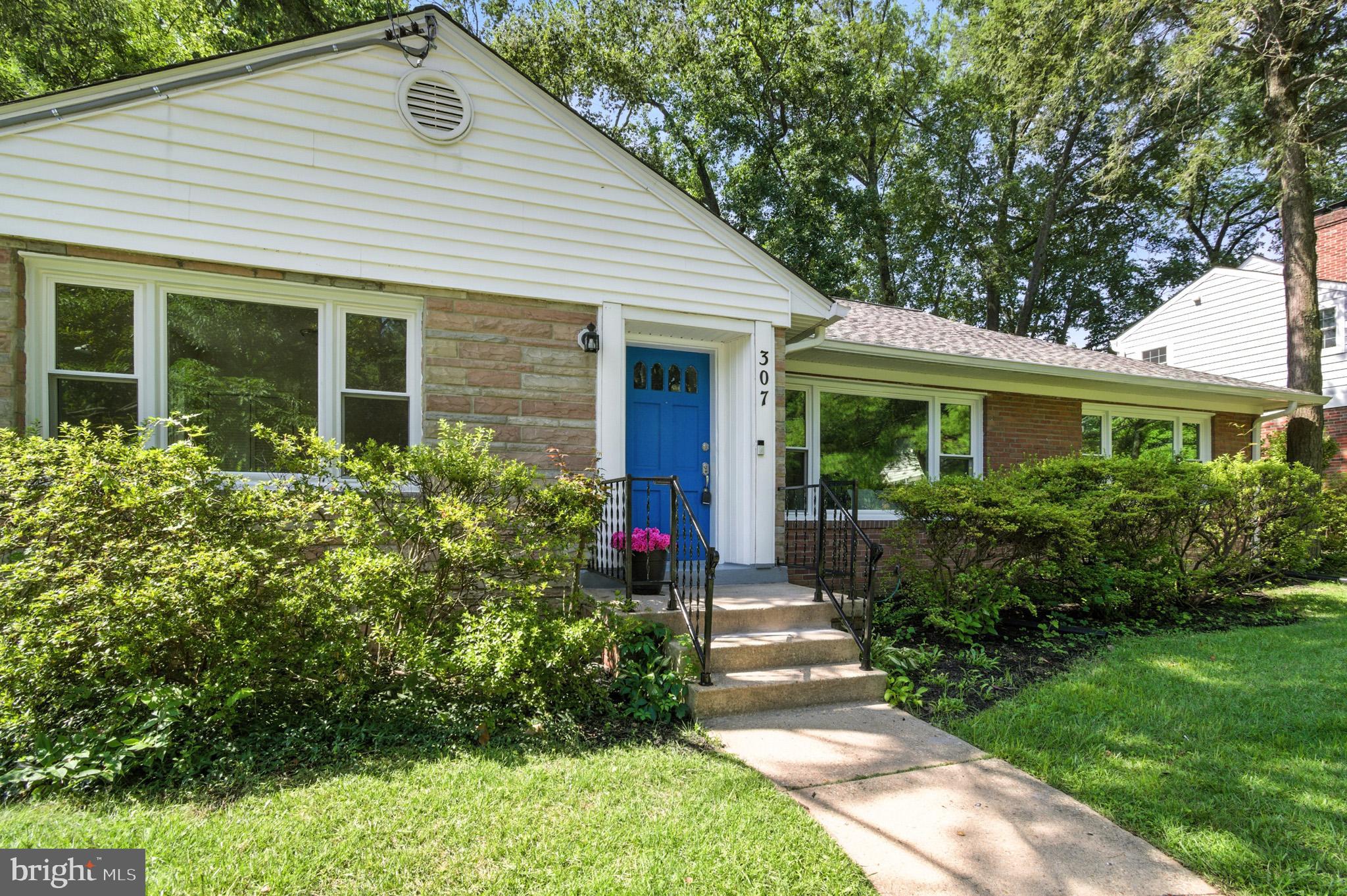 307 Plymouth Street Silver Spring, MD 20901 - Photo 2 of 44 a front view of a house with a yard