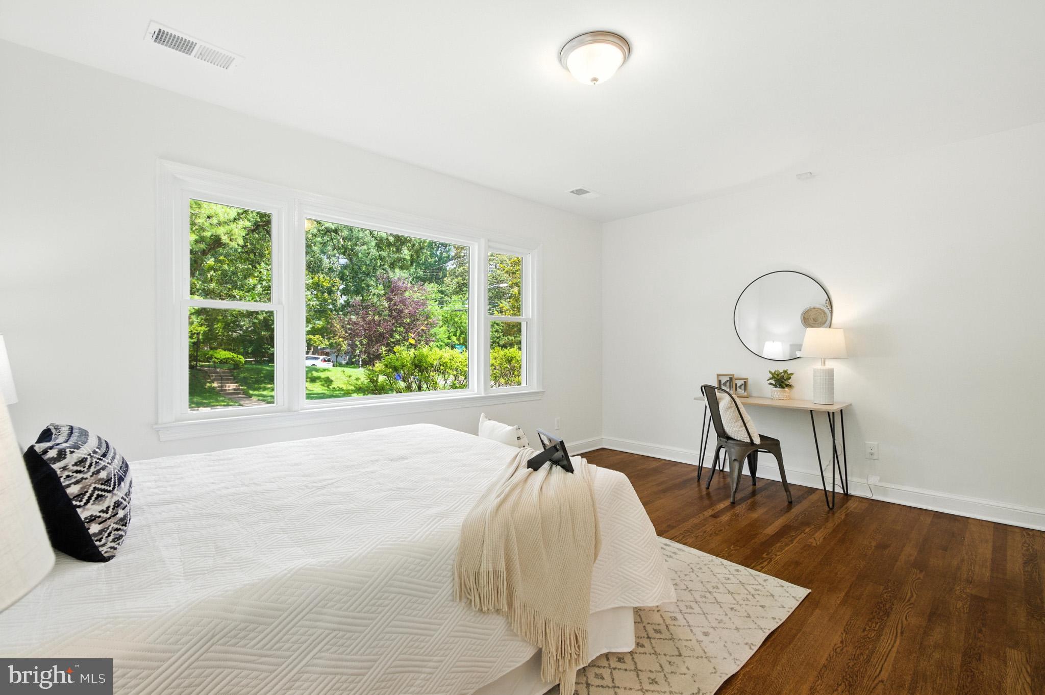 307 Plymouth Street Silver Spring, MD 20901 - Photo 29 of 44 a view of a room with furniture window and wooden floor