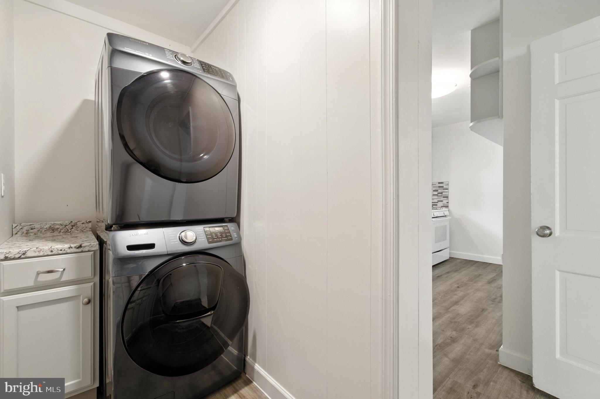 307 Plymouth Street Silver Spring, MD 20901 - Photo 31 of 44 a utility room with dryer and washer