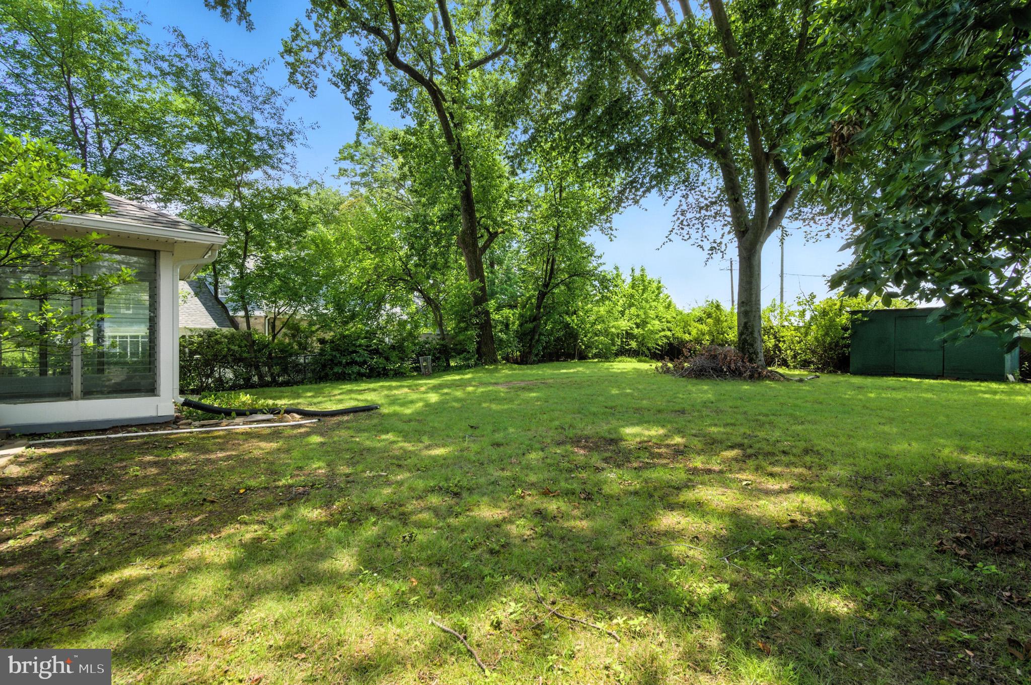 307 Plymouth Street Silver Spring, MD 20901 - Photo 40 of 44 a view of a backyard with a garden