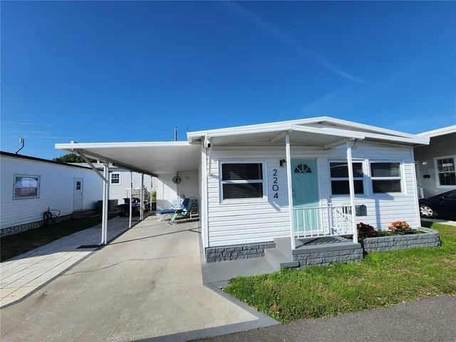 a view of a house with a patio