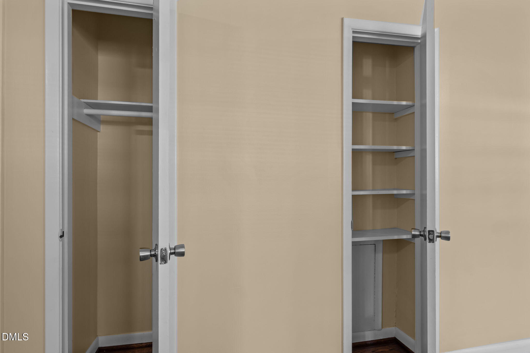 200 Davie Road, Unit A&B Carrboro, NC 27510 - Photo 11 of 36 a view of walk in closet with empty racks