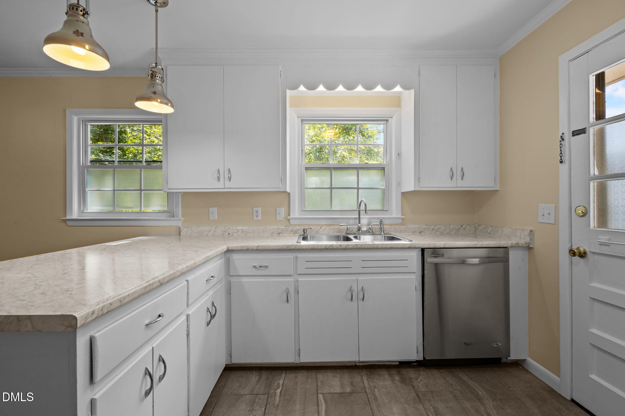 200 Davie Road, Unit A&B Carrboro, NC 27510 - Photo 22 of 36 a kitchen with a sink cabinets and window