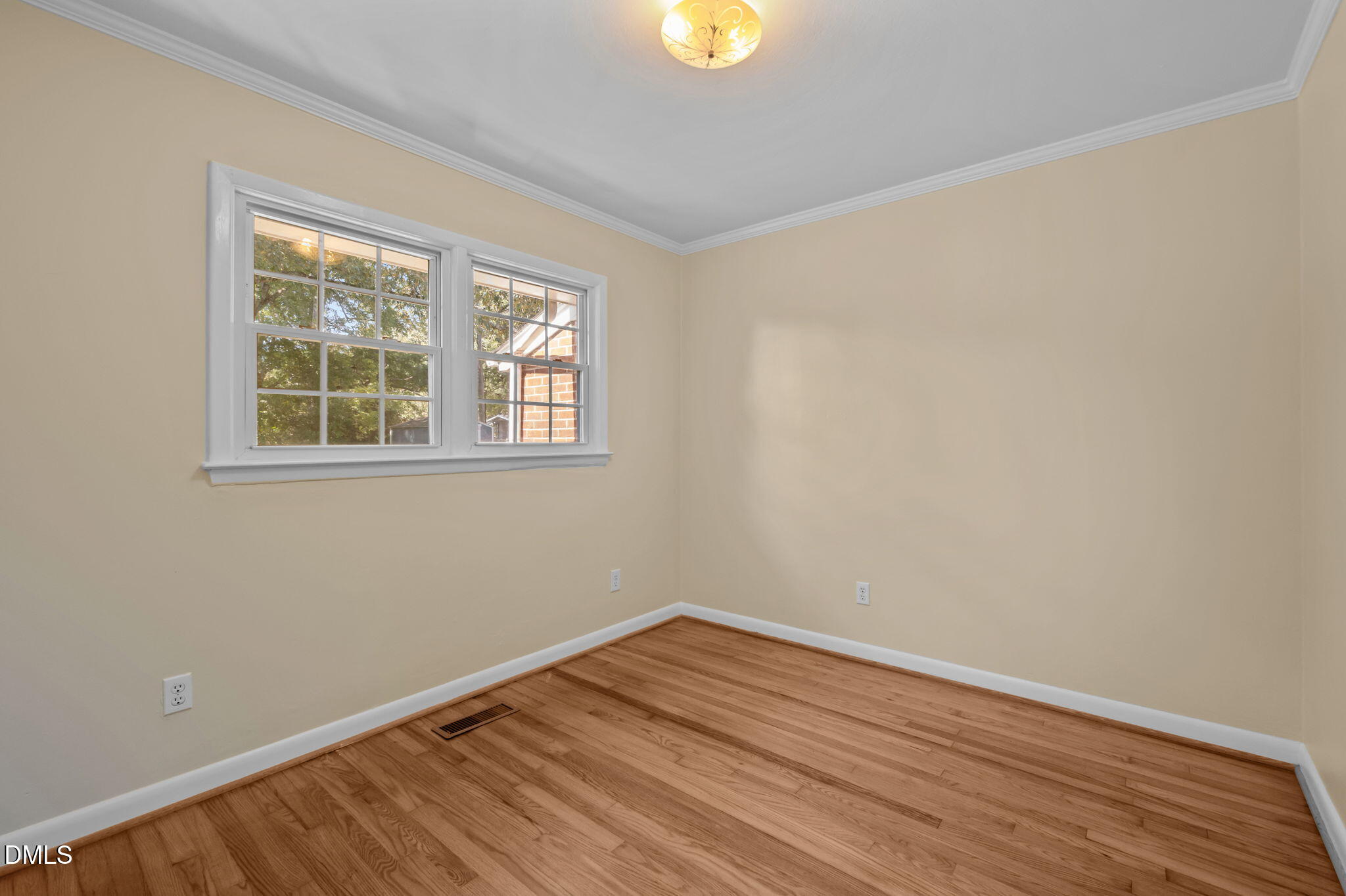 200 Davie Road, Unit A&B Carrboro, NC 27510 - Photo 27 of 36 wooden floor in an empty room with a window
