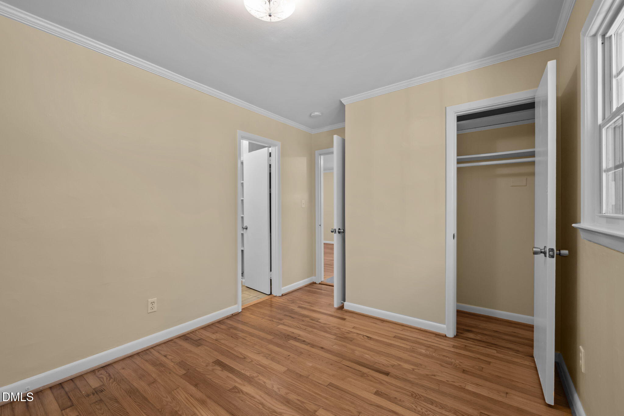 200 Davie Road, Unit A&B Carrboro, NC 27510 - Photo 28 of 36 a view of an empty room with wooden floor & closet