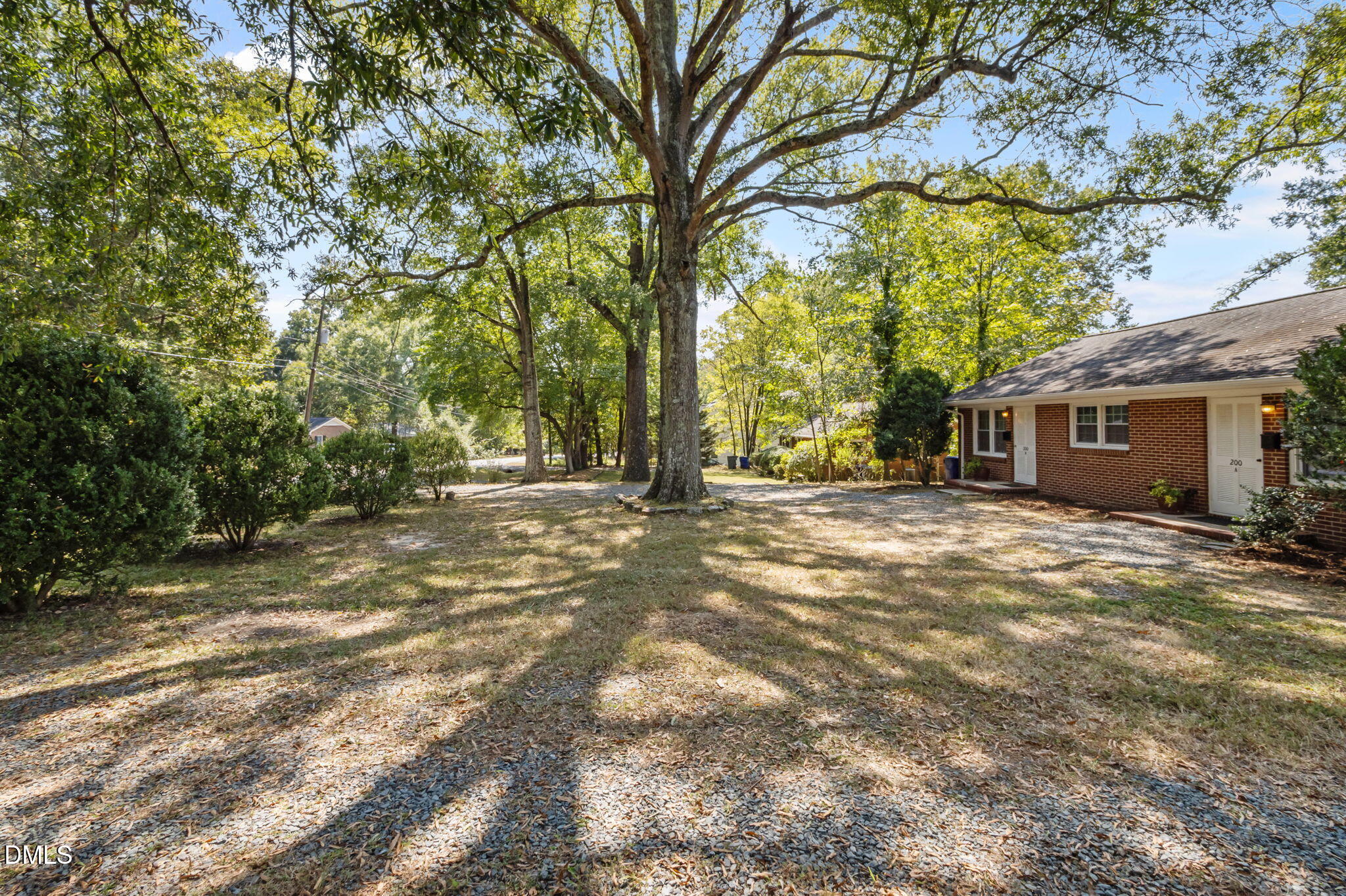 200 Davie Road, Unit A&B Carrboro, NC 27510 - Photo 31 of 36 a view of a house with backyard and trees