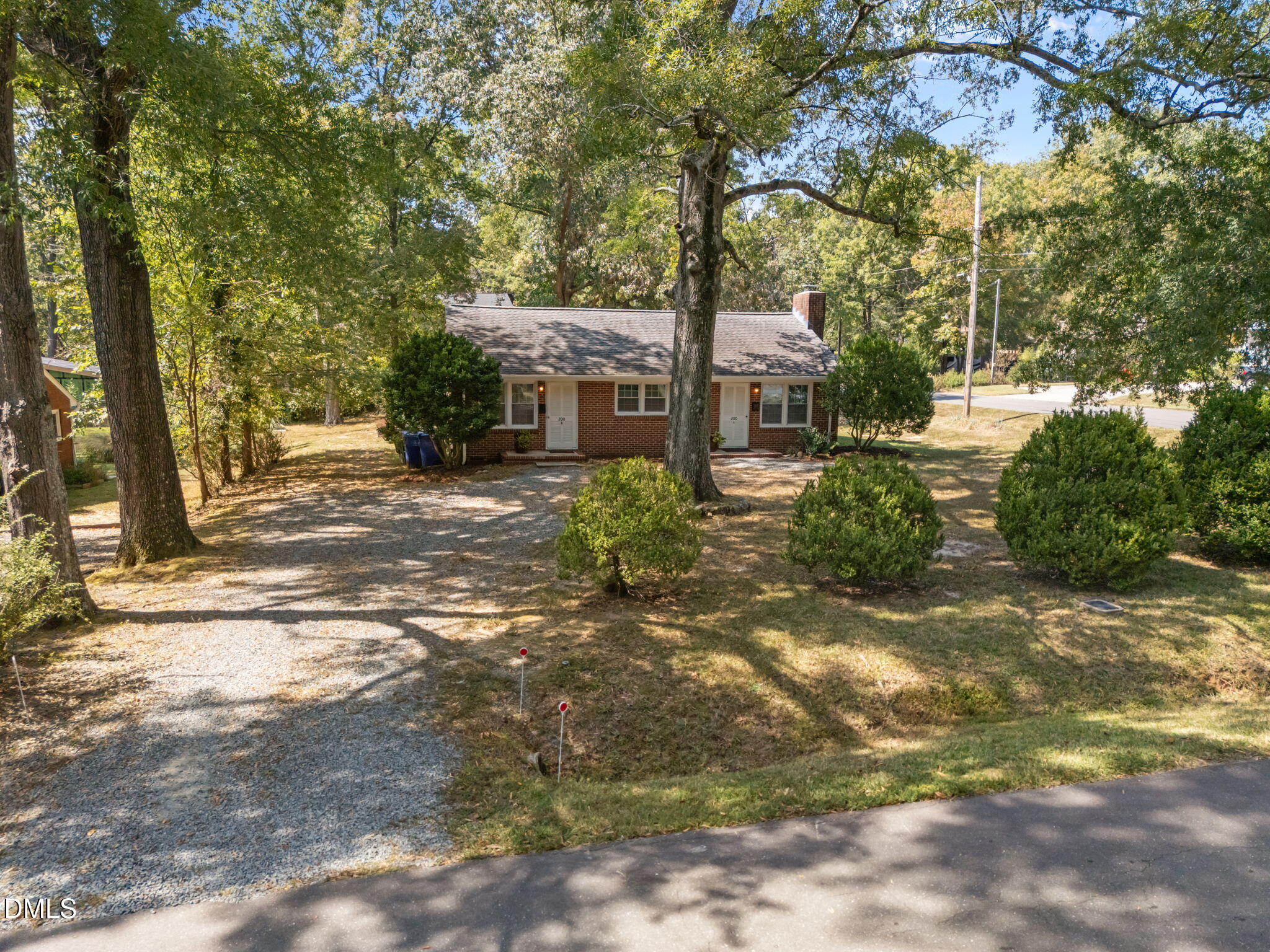 200 Davie Road, Unit A&B Carrboro, NC 27510 - Photo 32 of 36 a front view of a house with a tree