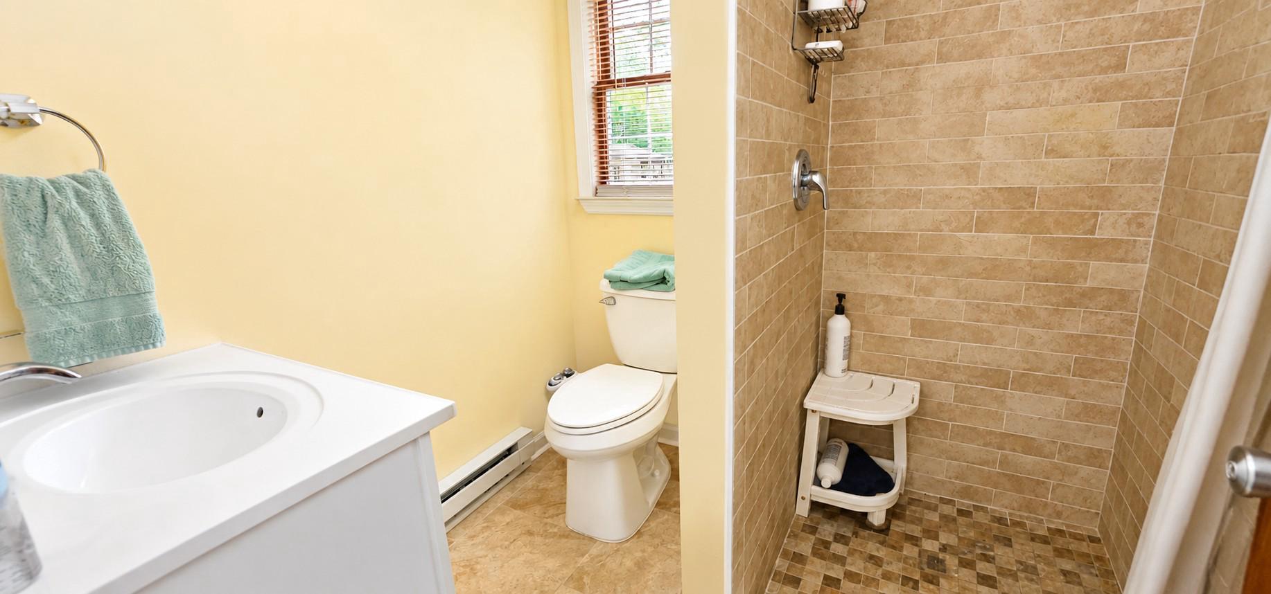 333 McGrath Road Eden, MD 21822 - Photo 17 of 22 a white toilet sitting next to a bathroom sink