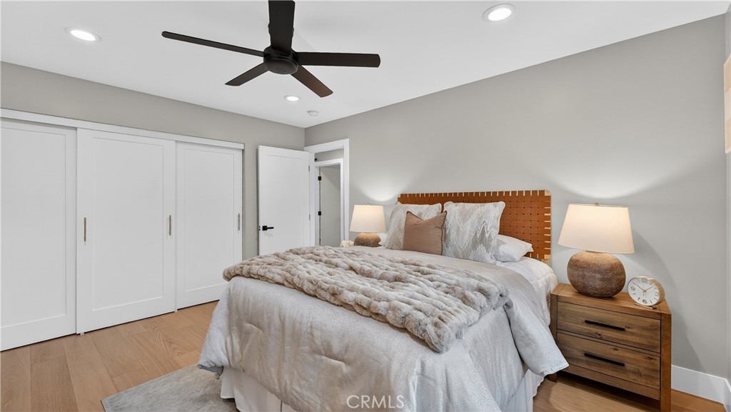 4404 Cogswell Road El Monte, CA 91732 - Photo 14 of 63 a bedroom with a bed and a chandelier