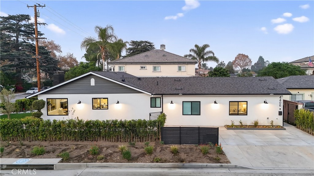4404 Cogswell Road El Monte, CA 91732 - Photo 2 of 63 a front view of a house with a yard and garage
