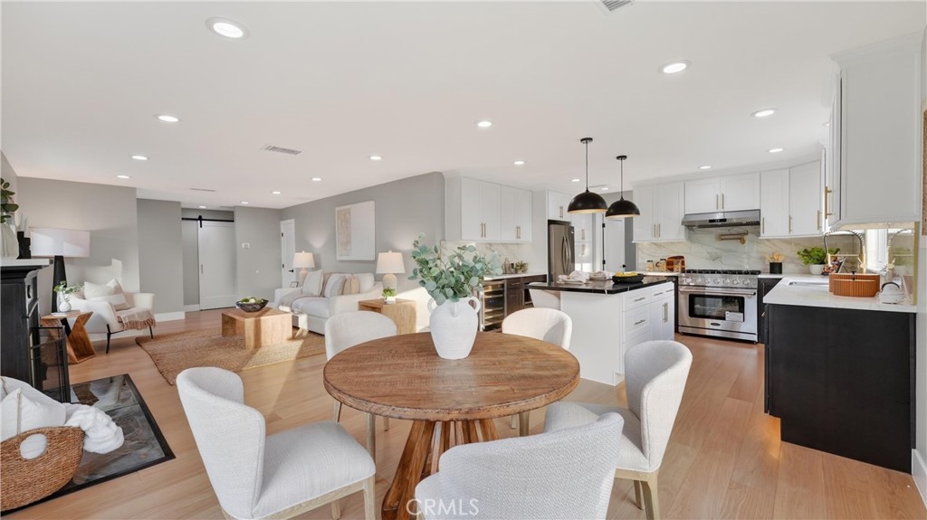 4404 Cogswell Road El Monte, CA 91732 - Photo 30 of 63 a dining room with furniture a table and kitchen view