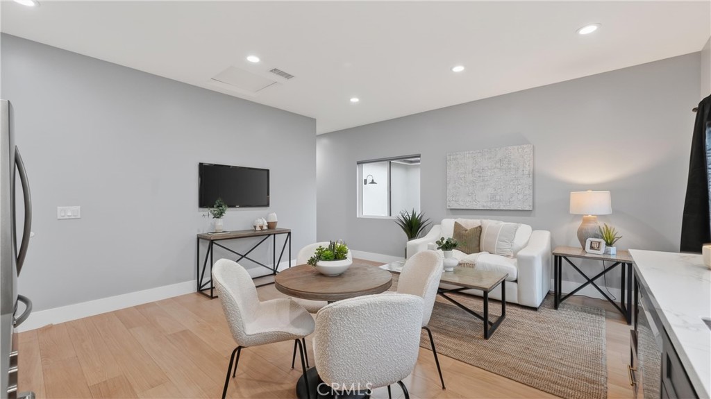 4404 Cogswell Road El Monte, CA 91732 - Photo 50 of 63 a living room with furniture and a flat screen tv