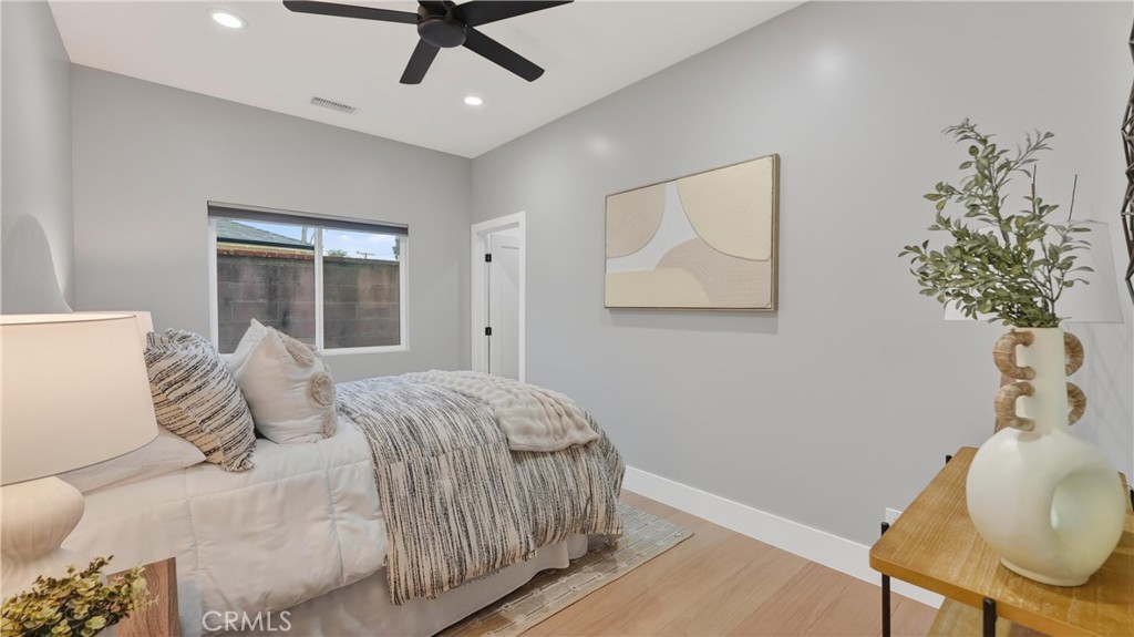 4404 Cogswell Road El Monte, CA 91732 - Photo 53 of 63 a bedroom with a bed and a chair