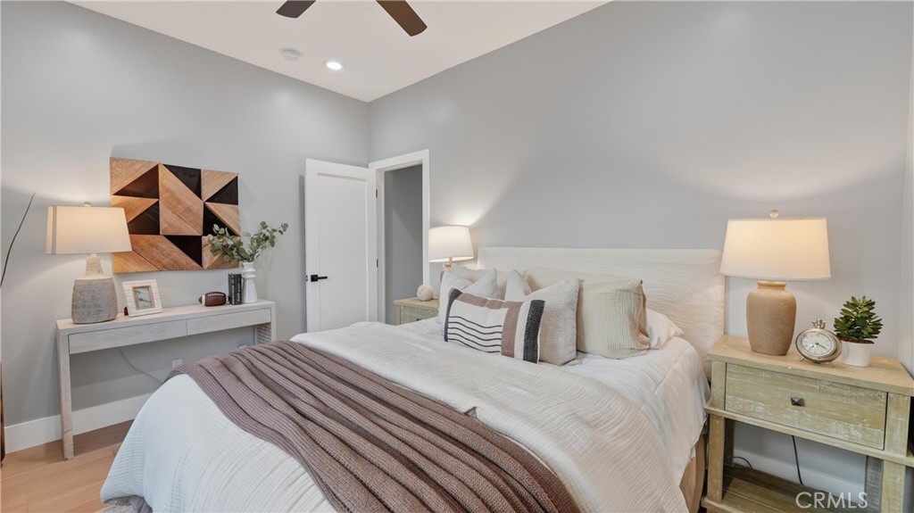 4404 Cogswell Road El Monte, CA 91732 - Photo 54 of 63 a bedroom with a bed and a lamp on the dresser