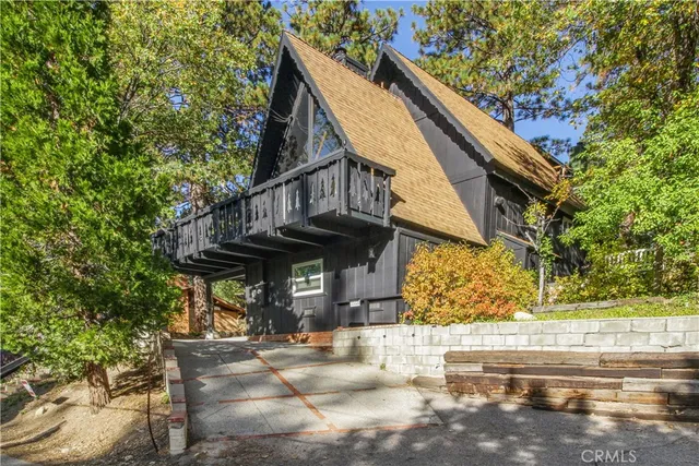 a view of a house with brick walls