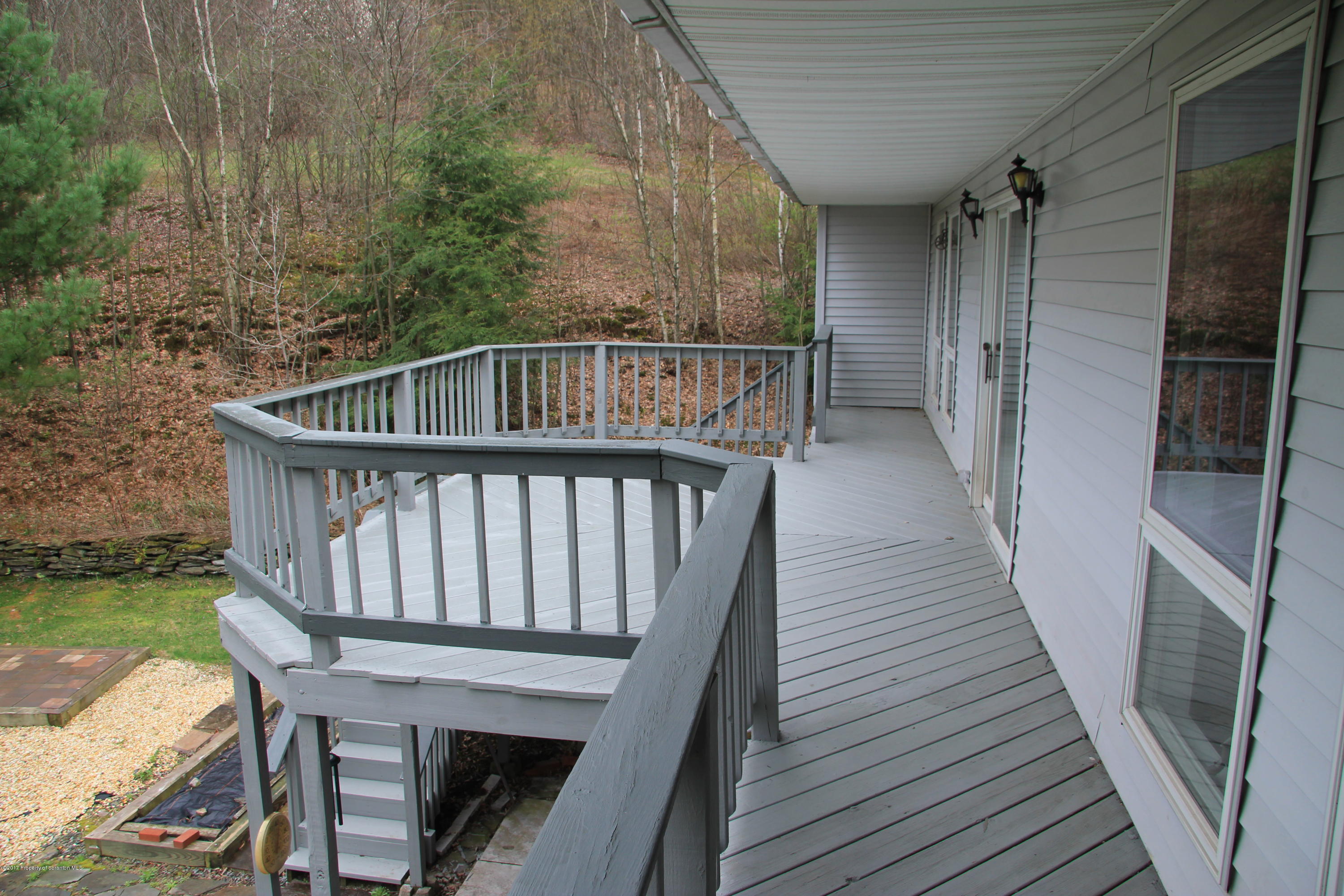 155 Blossom Road Nicholson, PA 18446 - Photo 13 of 35 a balcony view with a seating space