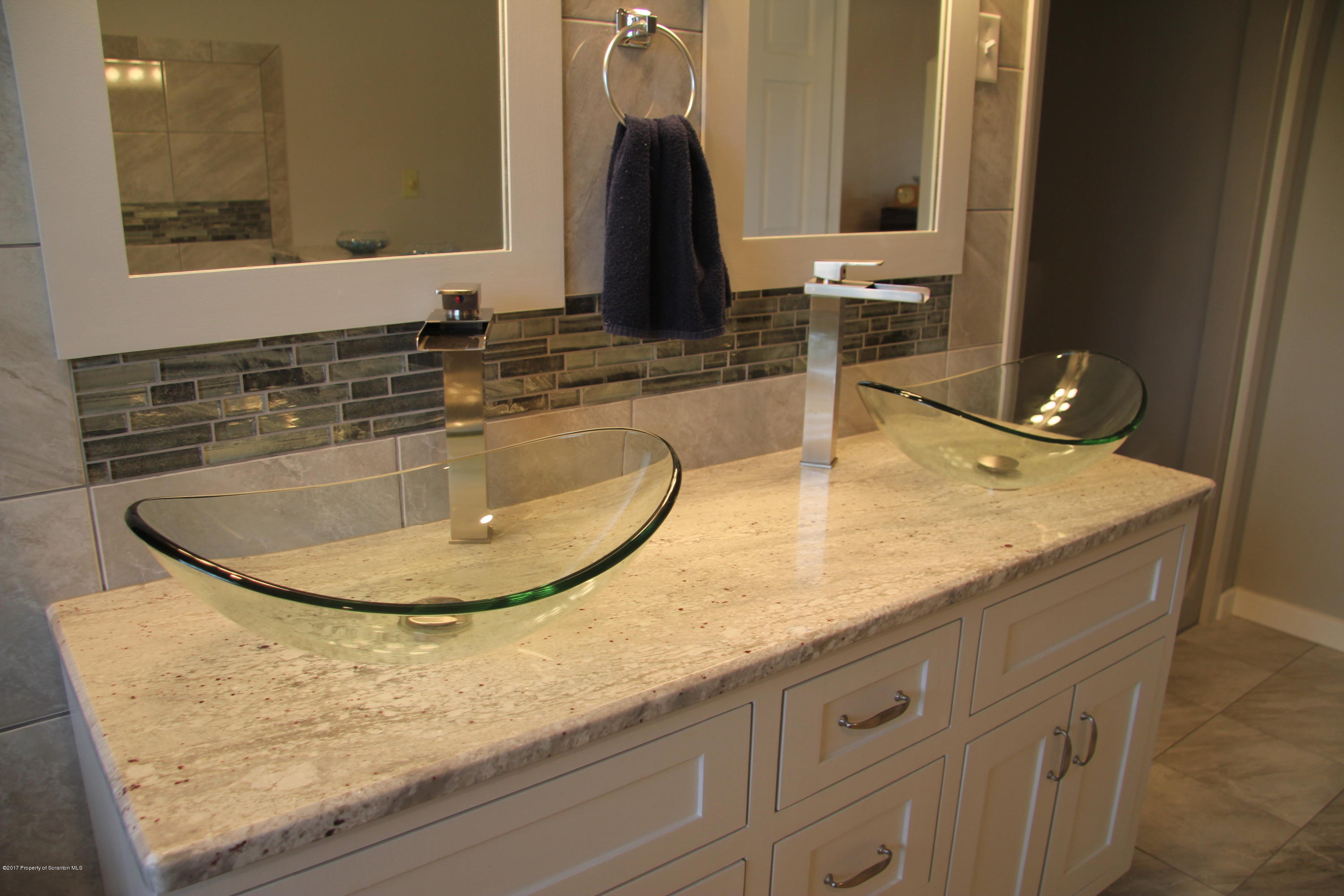 155 Blossom Road Nicholson, PA 18446 - Photo 16 of 35 a bathroom with sink and mirror