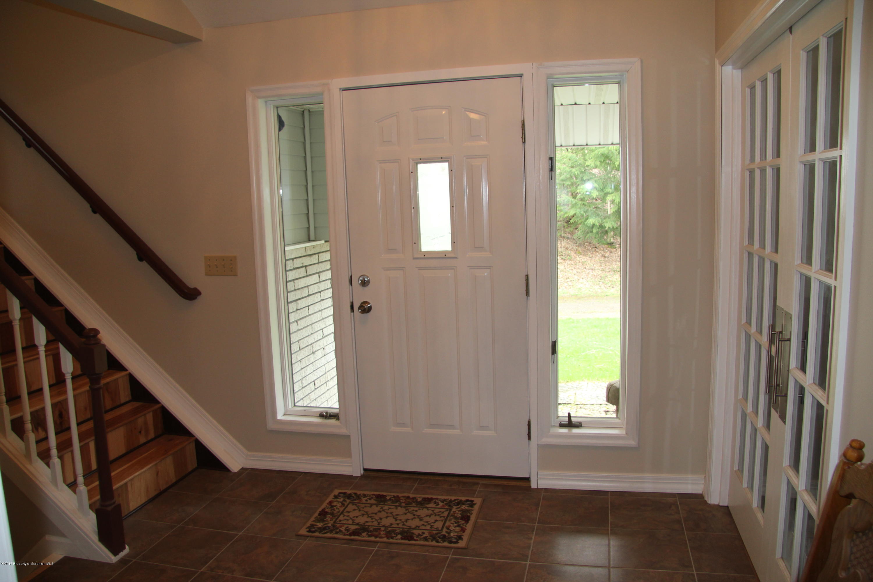 155 Blossom Road Nicholson, PA 18446 - Photo 3 of 35 a view of an entryway with a window