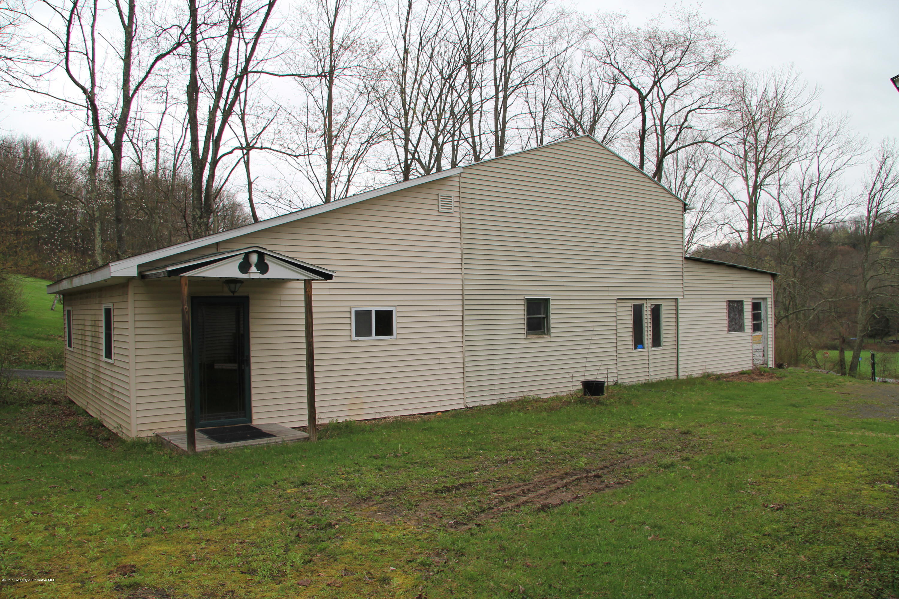 155 Blossom Road Nicholson, PA 18446 - Photo 32 of 35 a view of a house with a yard
