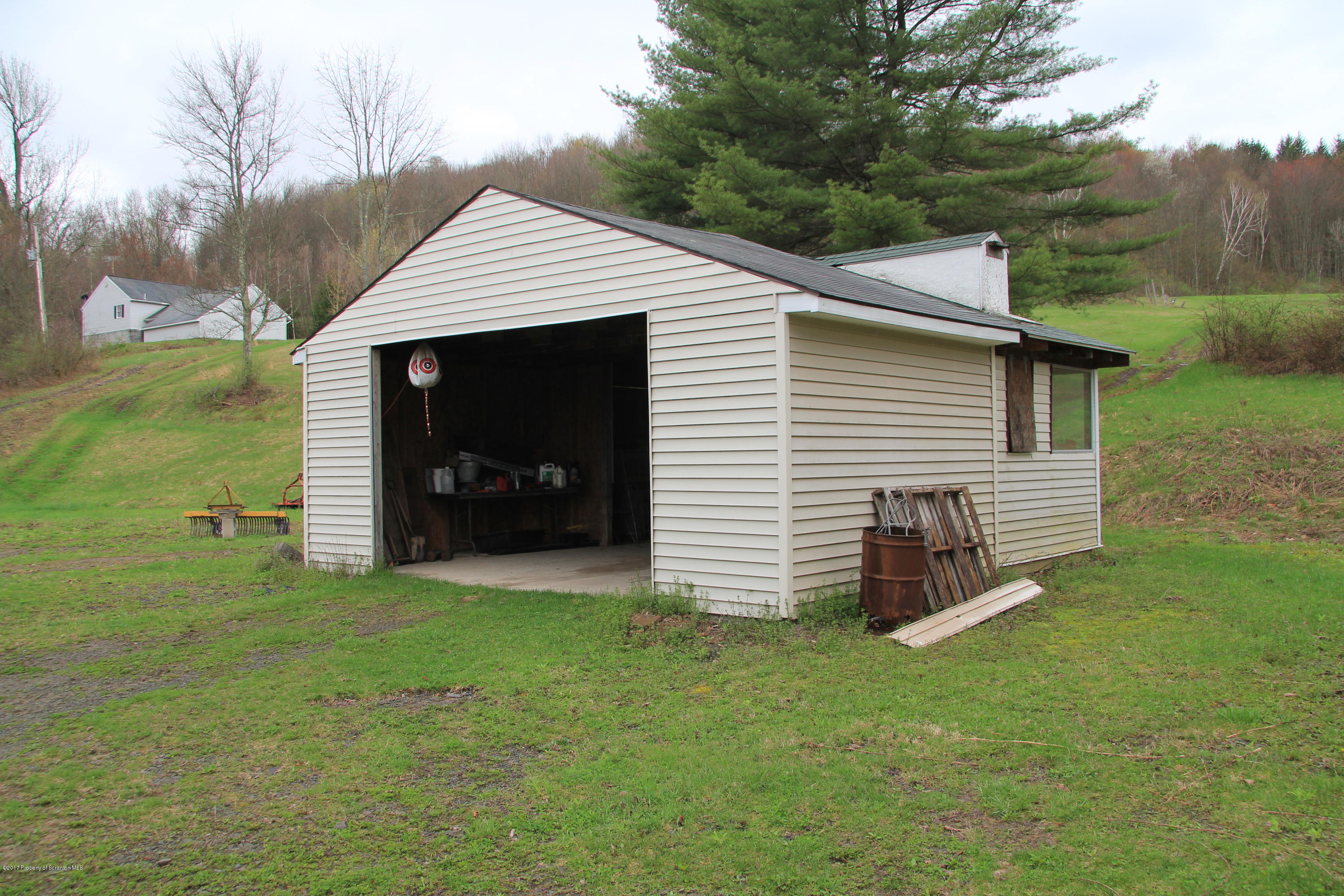 155 Blossom Road Nicholson, PA 18446 - Photo 33 of 35 a view of a house with a yard