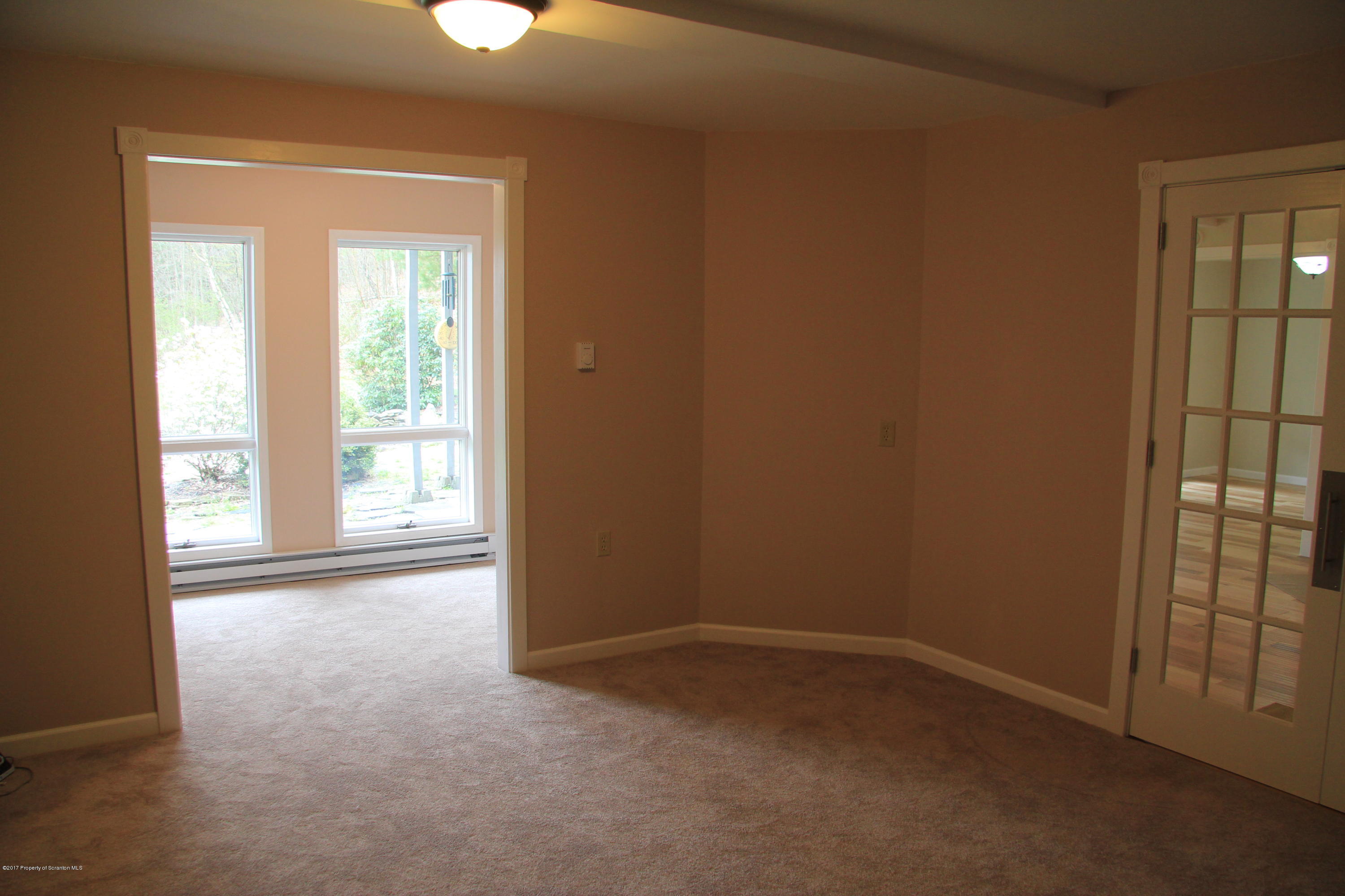 155 Blossom Road Nicholson, PA 18446 - Photo 7 of 35 an empty room with windows and closet