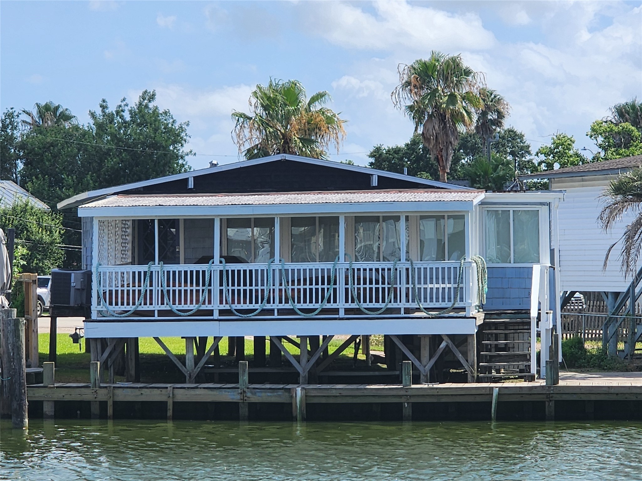 21 Tindel Street Clear Lake Shores, TX 77565 - Photo 2 of 12 a view of a house with a yard