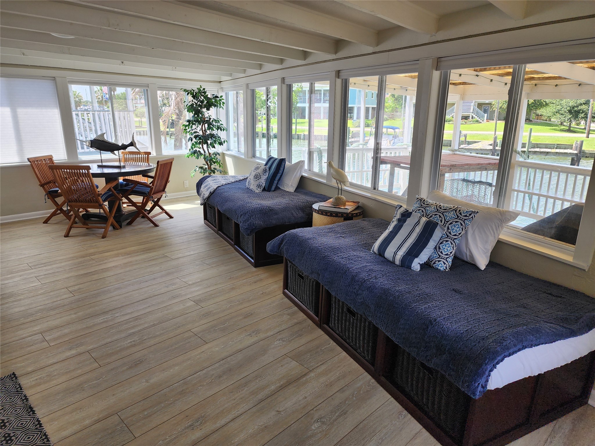 21 Tindel Street Clear Lake Shores, TX 77565 - Photo 3 of 12 a living room with furniture and large windows