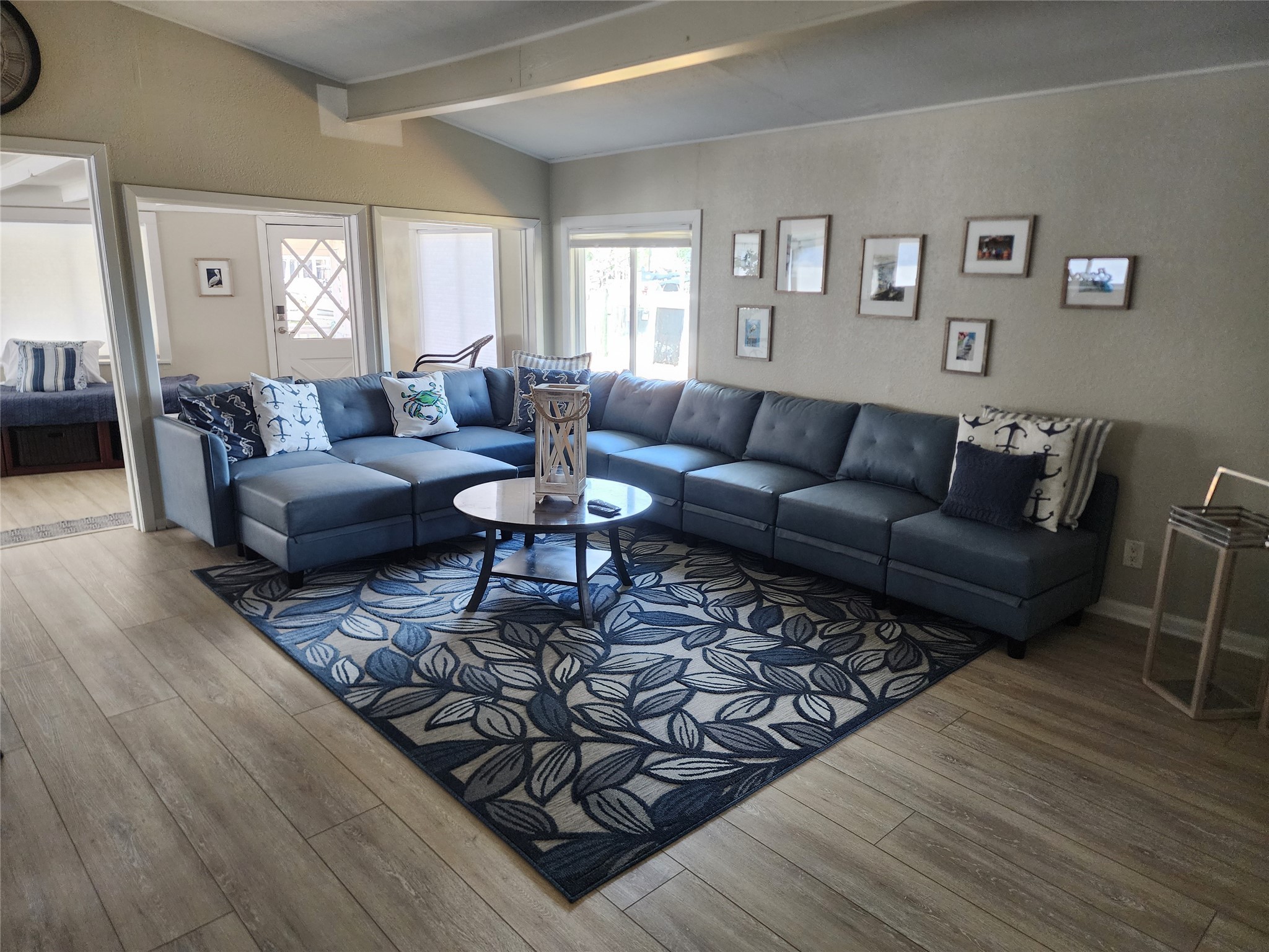 21 Tindel Street Clear Lake Shores, TX 77565 - Photo 4 of 12 a living room with furniture and wooden floor