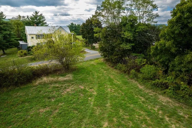 a view of a lake with a city