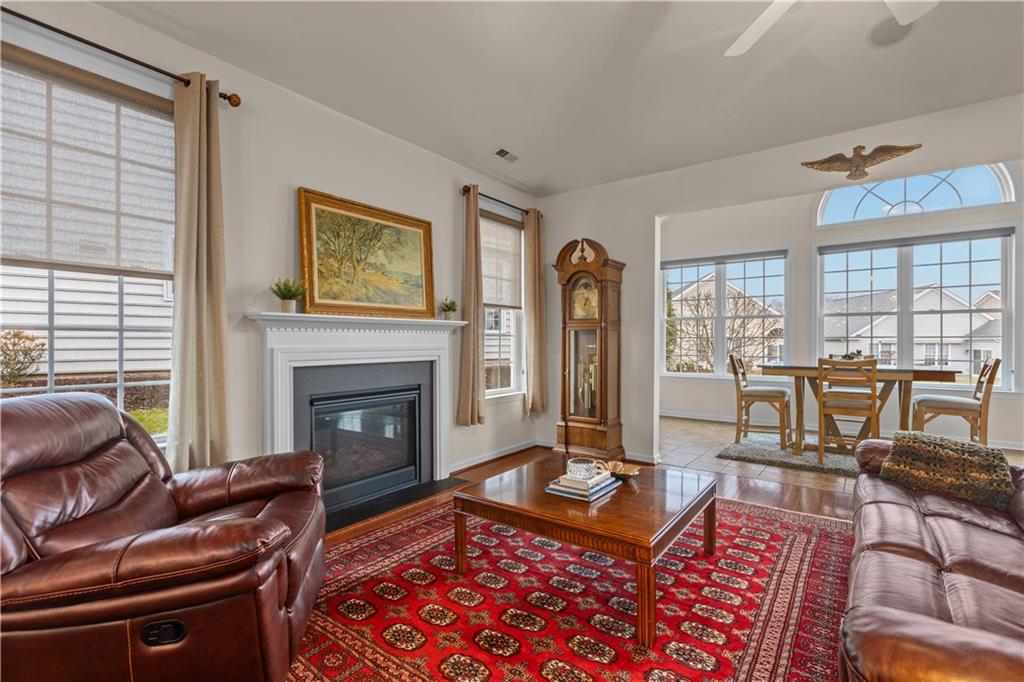137 Freedom Lane Sewickley, PA 15143 - Photo 14 of 36 a living room with furniture windows and a fireplace