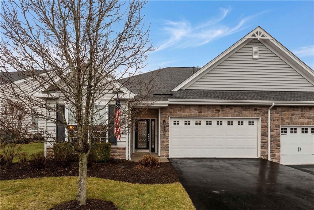 137 Freedom Lane Sewickley, PA 15143 - Photo 2 of 36 a front view of a house with garden