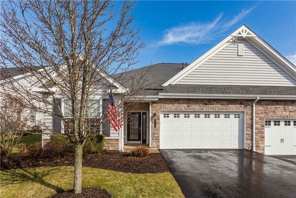 137 Freedom Lane Sewickley, PA 15143 - Photo 35 of 36 a front view of a house with garage