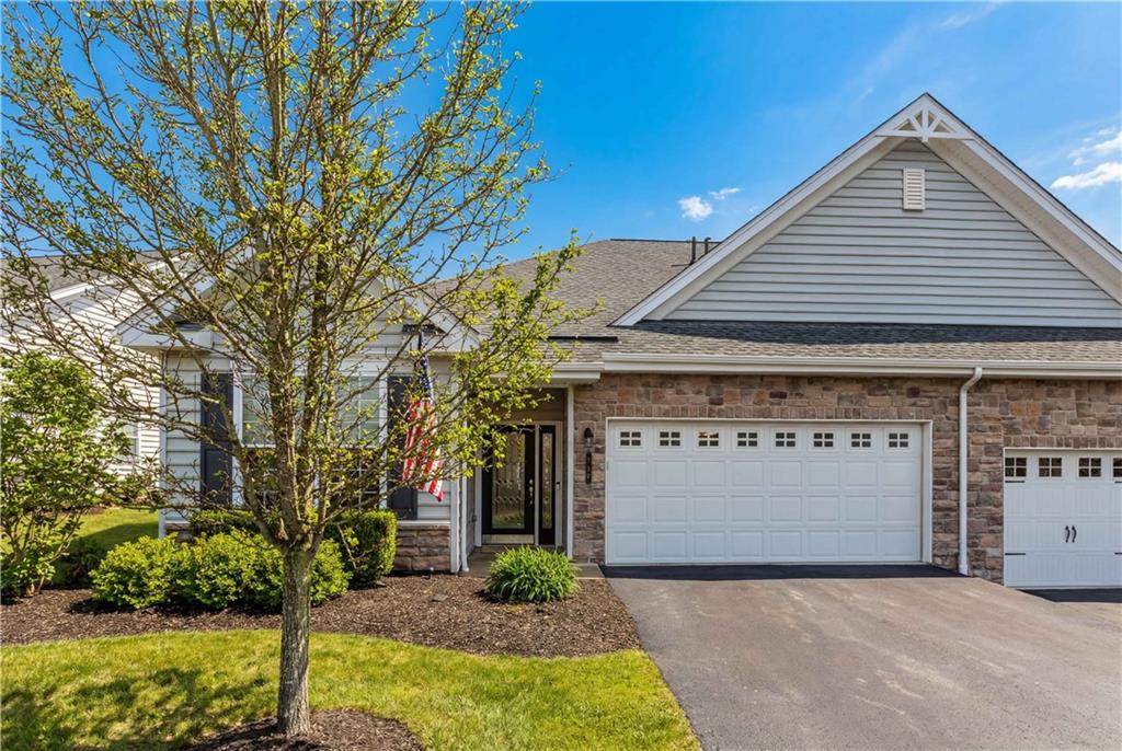 137 Freedom Lane Sewickley, PA 15143 - Photo 4 of 36 a front view of a house with garden