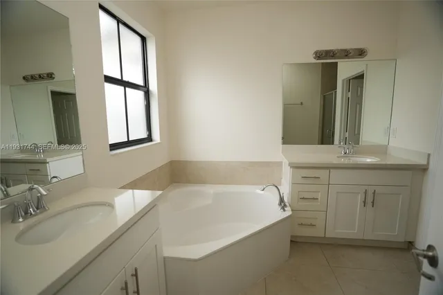 a bathroom with a sink and a bathtub