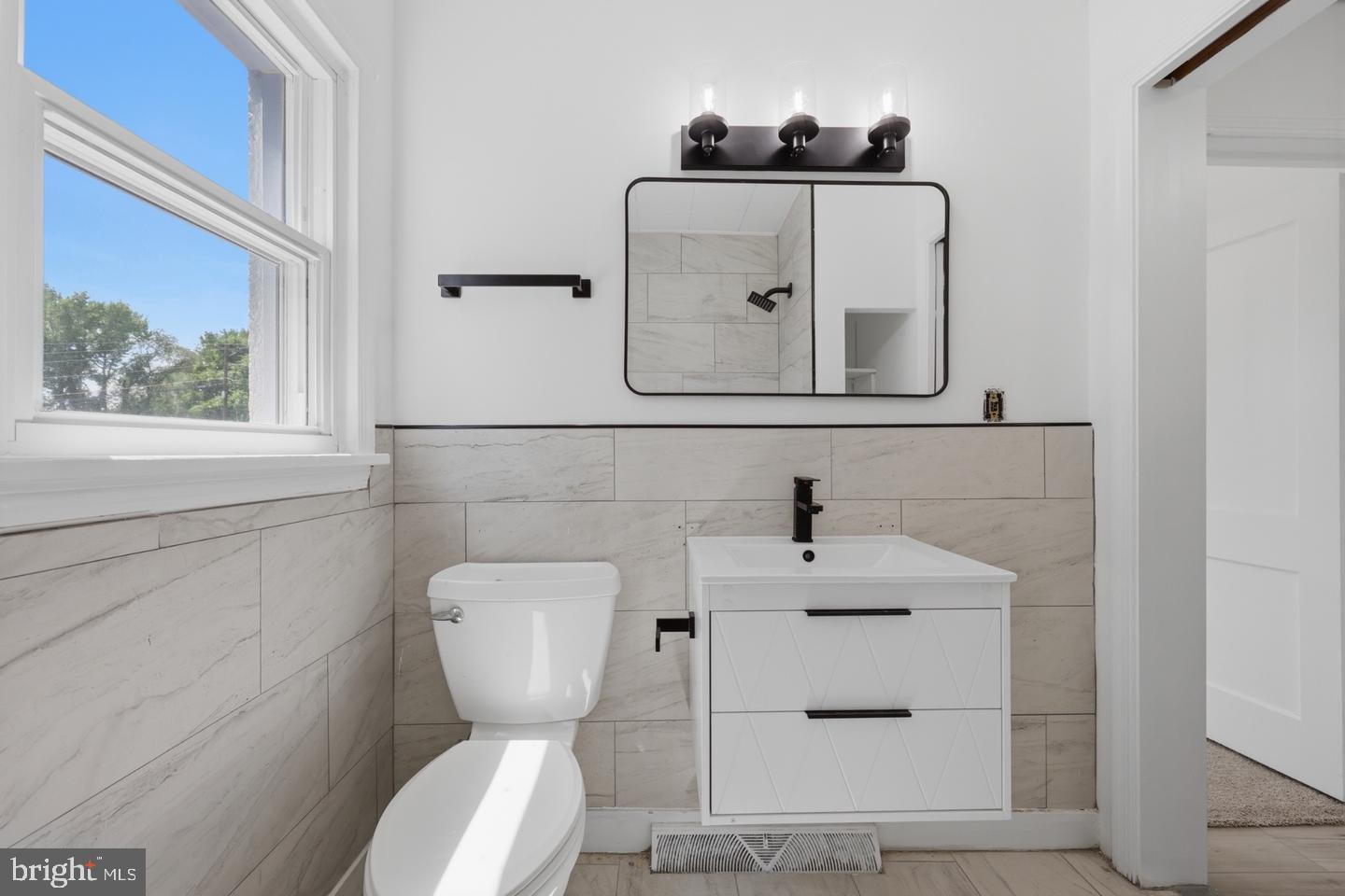 8251 Marshall Corner Road Pomfret, MD 20675 - Photo 10 of 20 Modern bathroom with sleek design.
