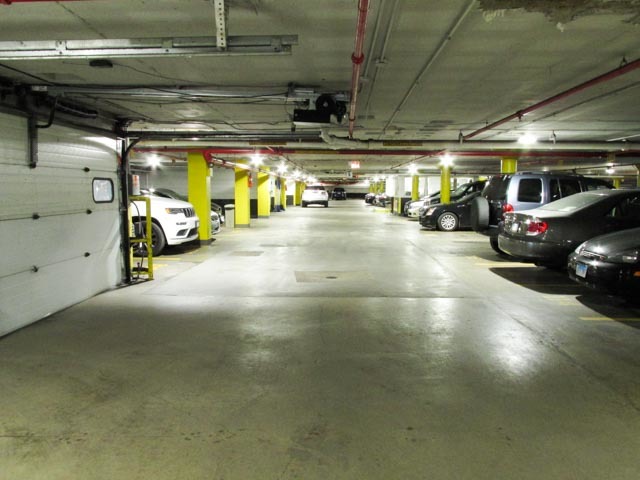 6301 North Sheridan Road, Unit 19A Chicago, IL 60660 - Photo 23 of 24 a view of parking garage with cars