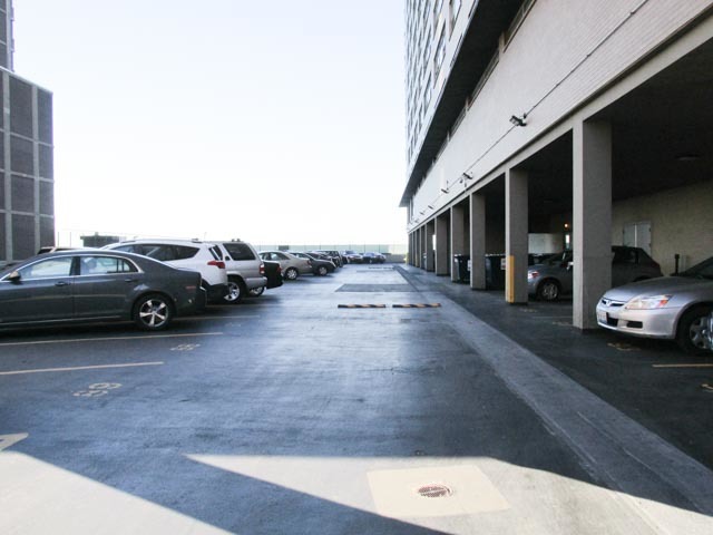 6301 North Sheridan Road, Unit 19A Chicago, IL 60660 - Photo 24 of 24 a view of a cars park in front of a building