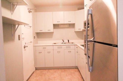 6301 North Sheridan Road, Unit 19A Chicago, IL 60660 - Photo 7 of 24 a kitchen with a refrigerator and a sink
