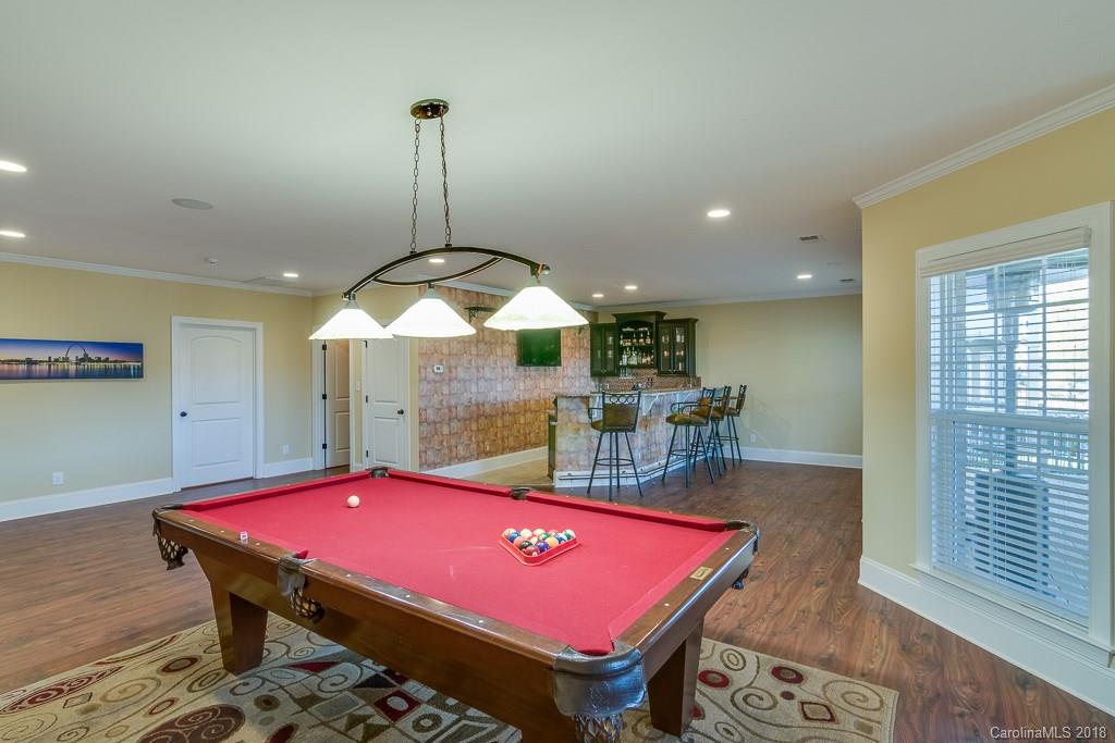 1770 Verdict Ridge Drive Denver, NC 28037 - Photo 13 of 36 a room with pool table and windows