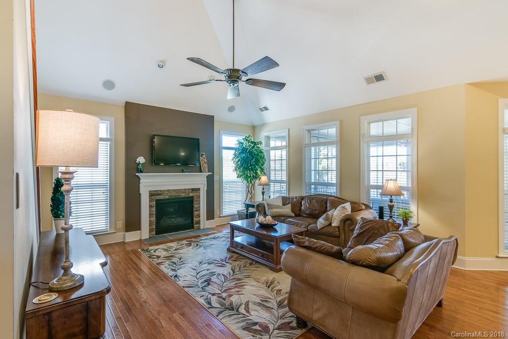 1770 Verdict Ridge Drive Denver, NC 28037 - Photo 17 of 36 a living room with furniture flat screen tv and a fireplace