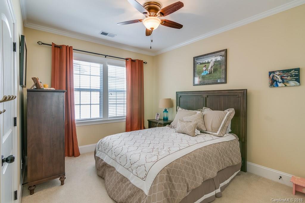 1770 Verdict Ridge Drive Denver, NC 28037 - Photo 20 of 36 a bedroom with a bed and a window