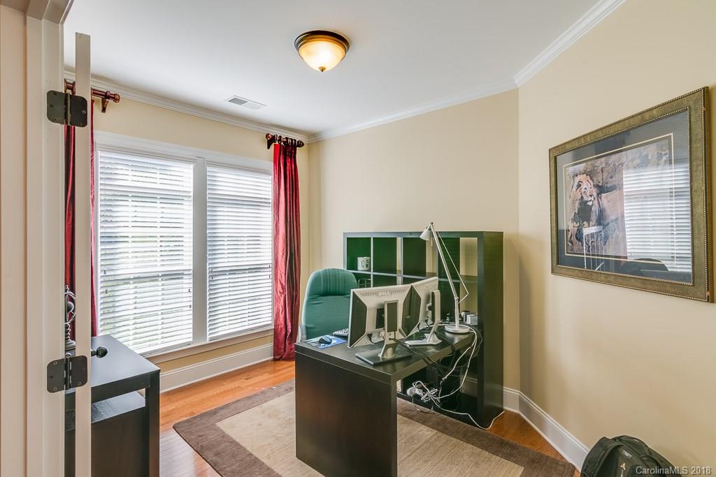 1770 Verdict Ridge Drive Denver, NC 28037 - Photo 24 of 36 a view of a workspace with furniture and a window