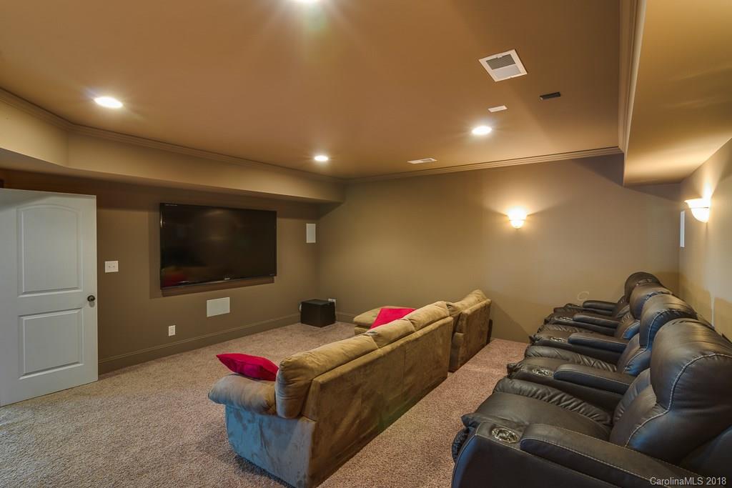 1770 Verdict Ridge Drive Denver, NC 28037 - Photo 26 of 36 a living room with furniture and a flat screen tv
