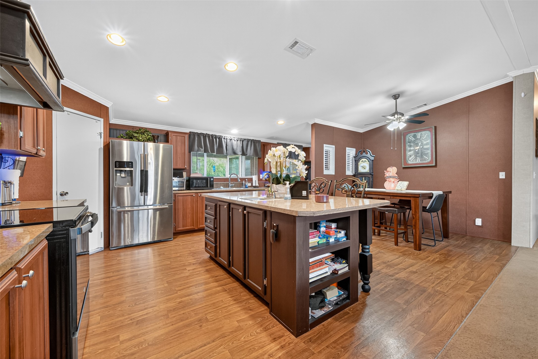 10715 Bozeman Ferry Road Midway, TX 75852 - Photo 11 of 50 This inviting kitchen and living room combo is designed for comfort and functionality.