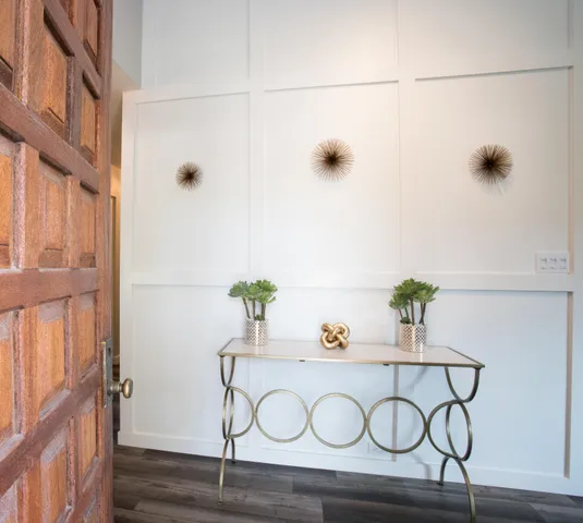 a view of entryway with wooden floor